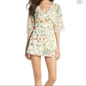New with tags Ali & Jay fresh blossoms romper ivory colored floral print